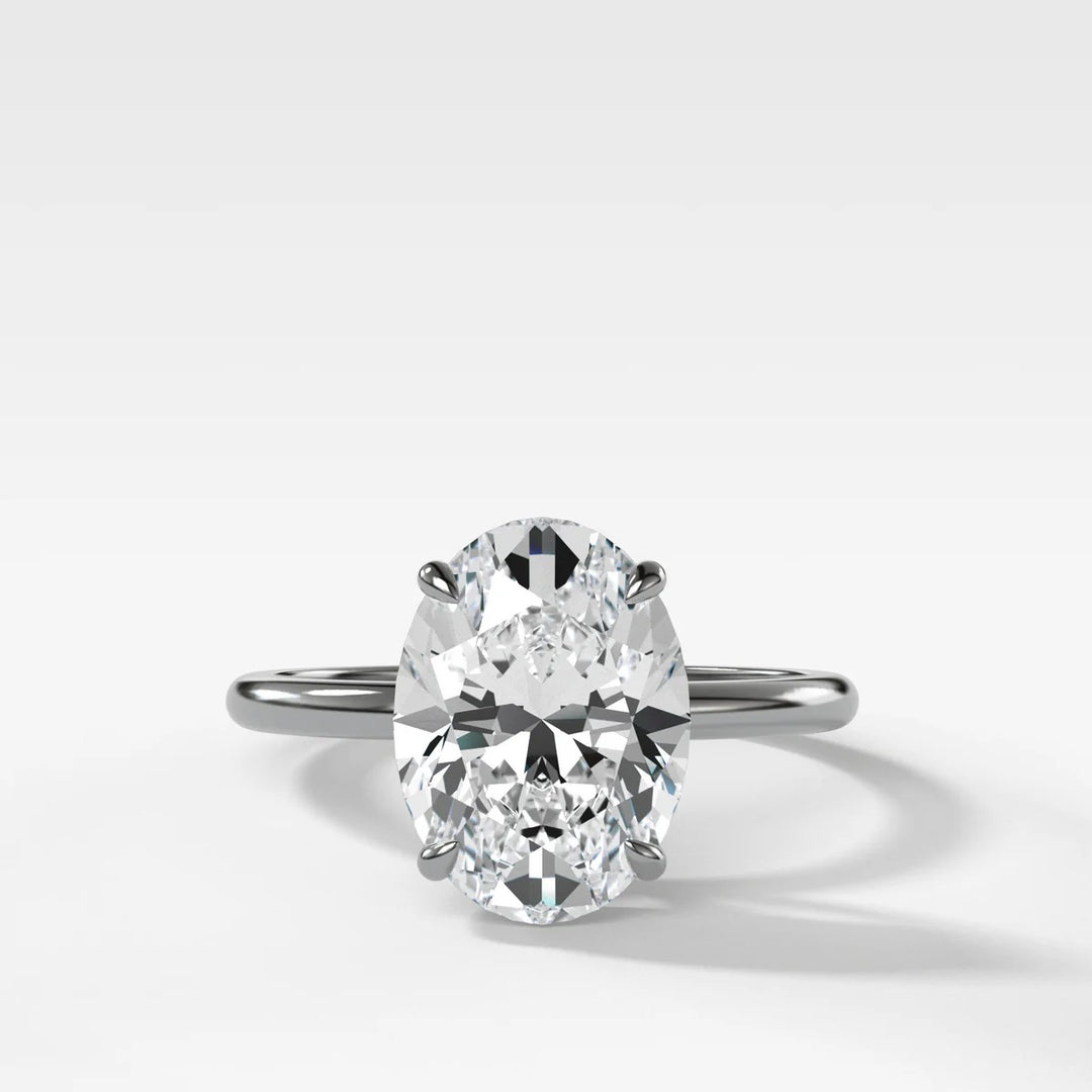 2.50ct oval lab-grown diamond solitaire set in polished platinum front view showing brilliance