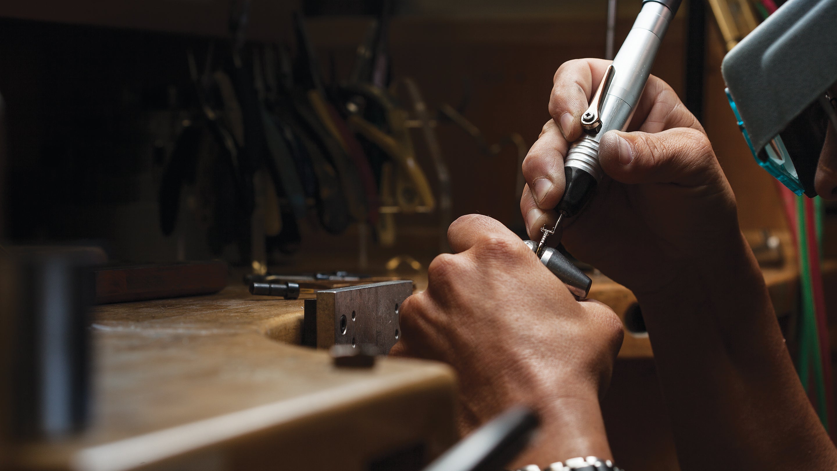 Couture Jewelry designer creating a custom engagement ring in NYC Diamond District studio