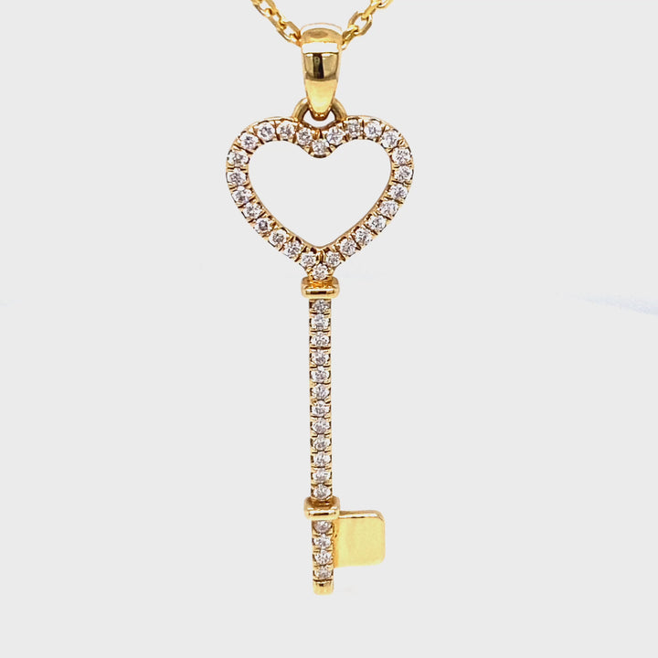 Elegant 18K Gold Diamond Heart Key Pendant